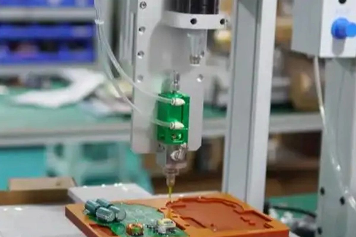 Automated adhesive dispensing workstation for production lines
